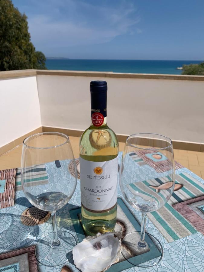 La Bussola Hotel Porto Palo Bagian luar foto
